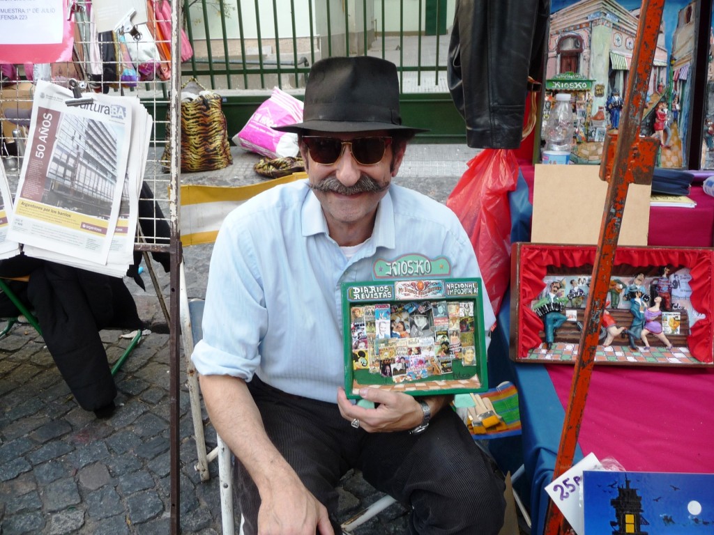 Artist with his work