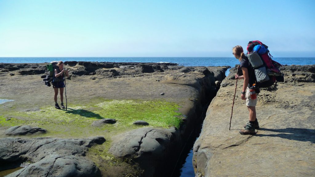 Jumping over surge channel, West Coast Trail