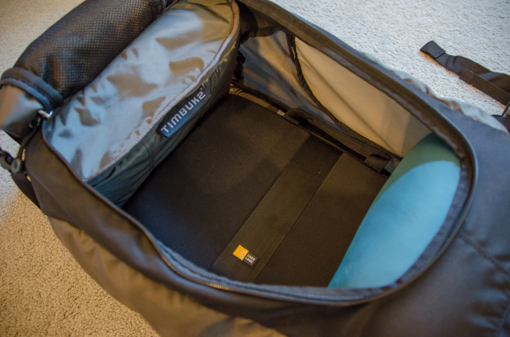 Camera bag and laptop case inside backpack