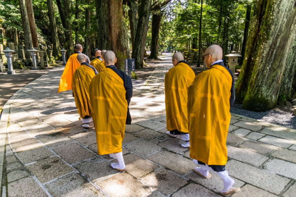 Monks walking into Okunoin Cemetery, Mount Koya