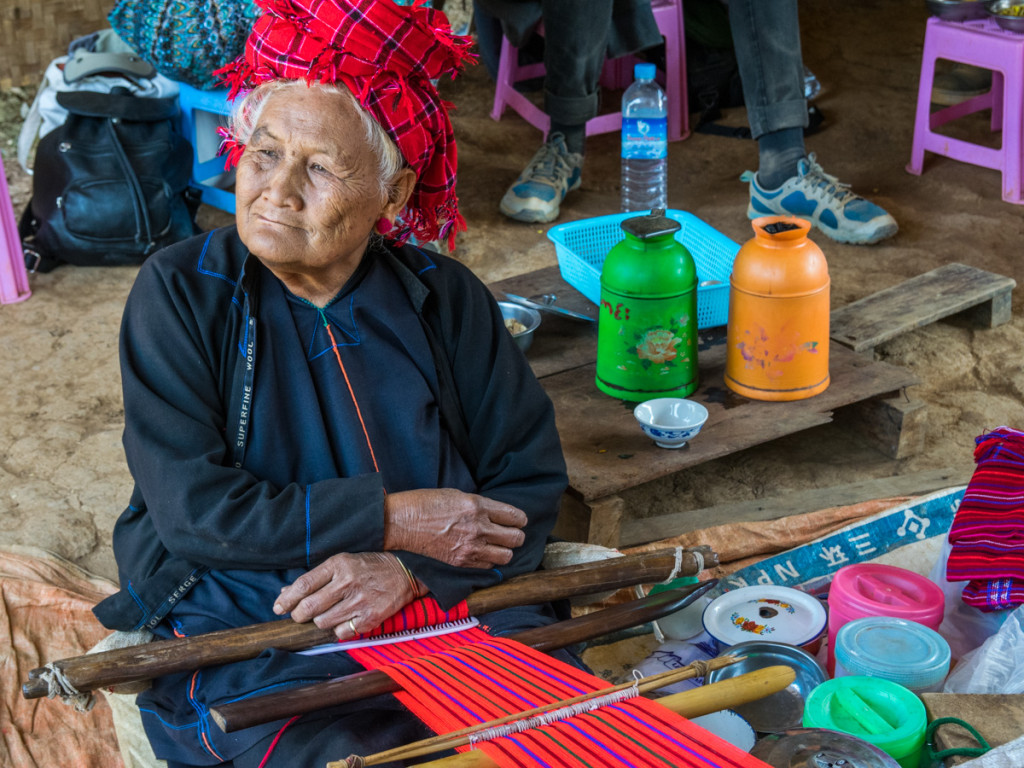 Local woman weaving bags, hike from Kalaw to Inle Lake