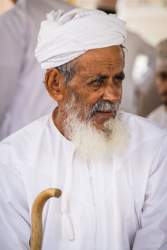 Man at Goat Market in Nizma, Oman