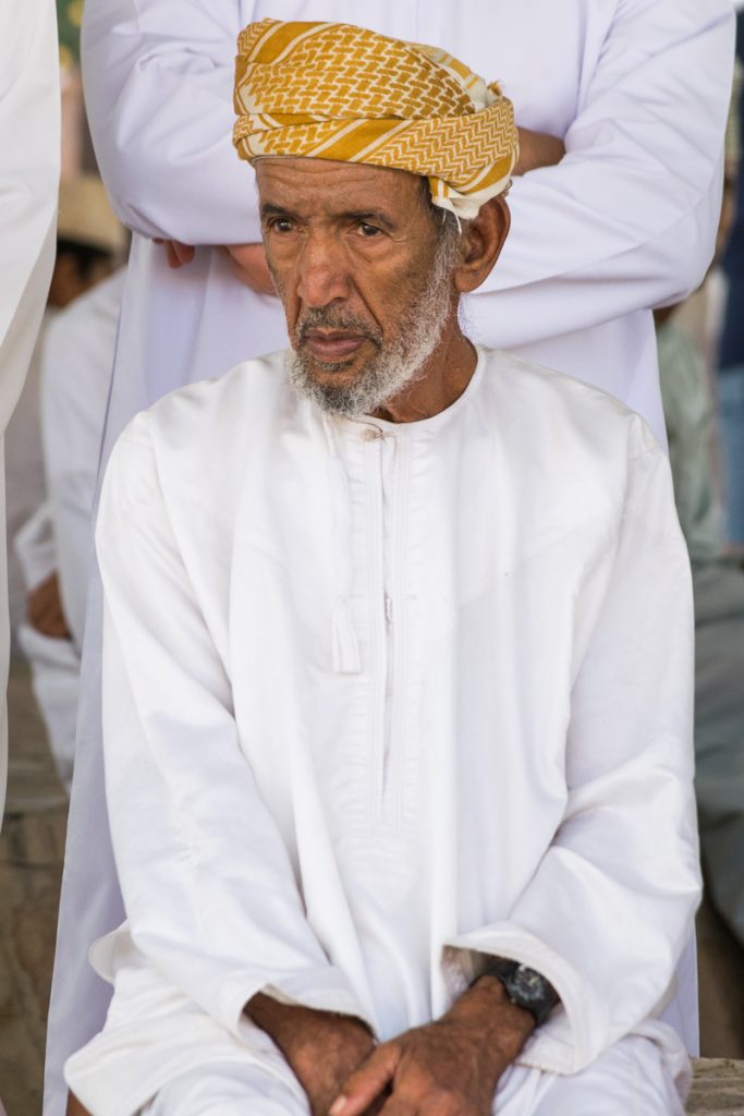 Man at Goat Market in Nizma, Oman